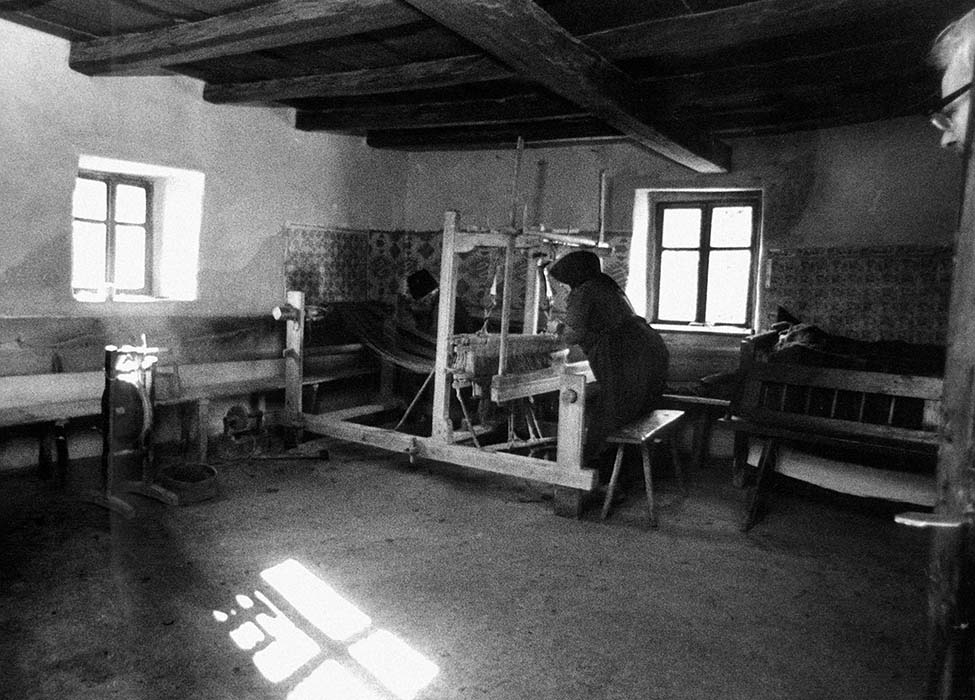 Room where Felszeg Dance Events are held, with Klára Győri, "Auntie Kali," weaving; 1967